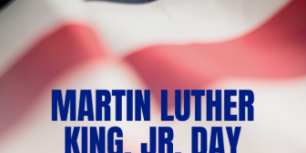US Flag in background with blue text letters stating MLK Jr Day